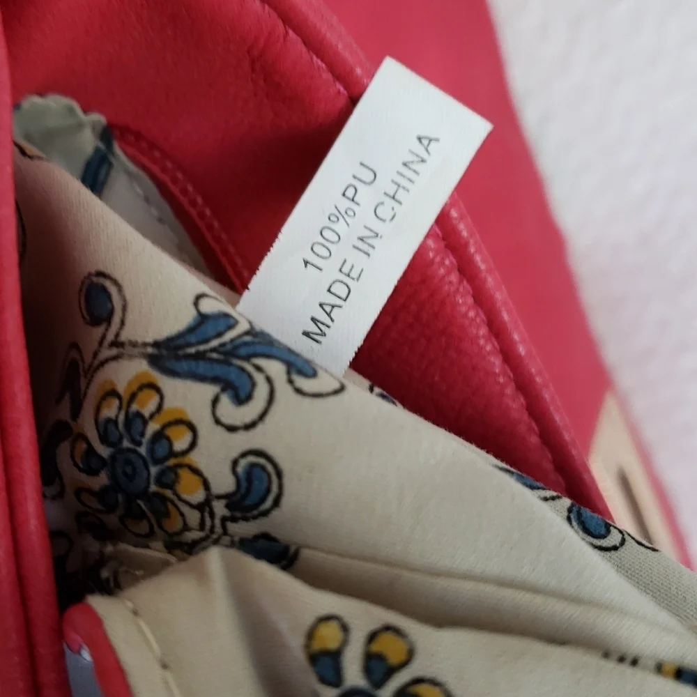 RED studded-embellished lipstick red vegan leather shoulder bag